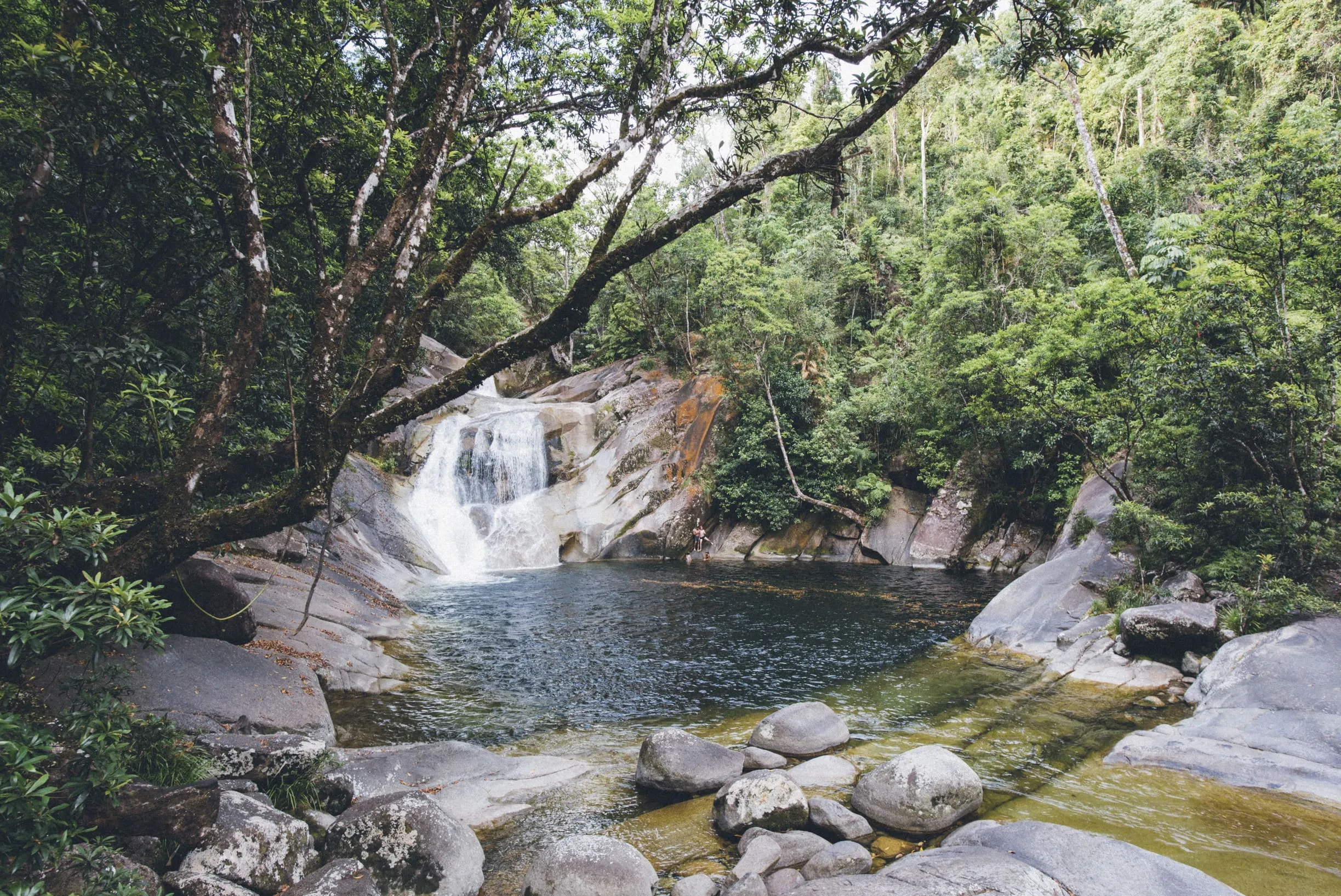 You can slide down rocks at Josephine Falls